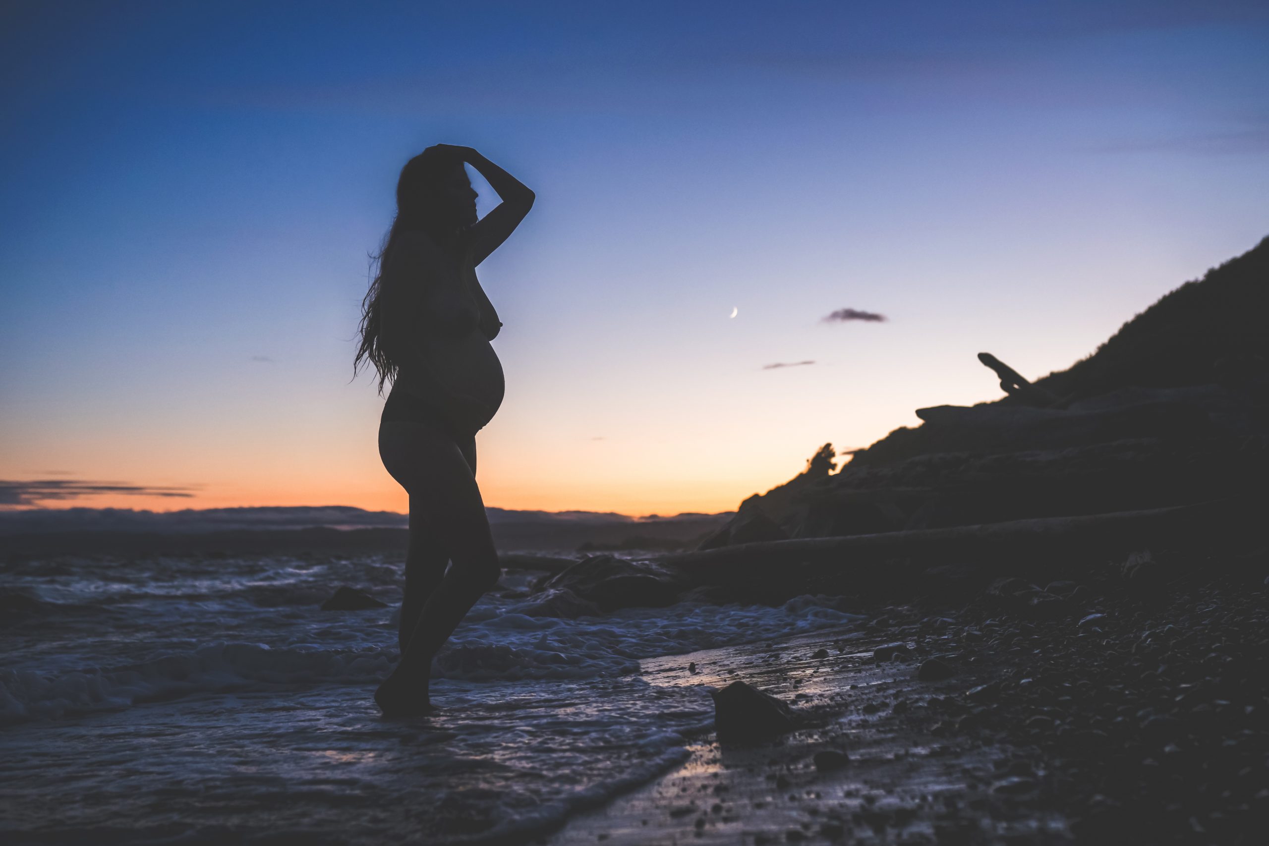 silhouette of pregnant belly